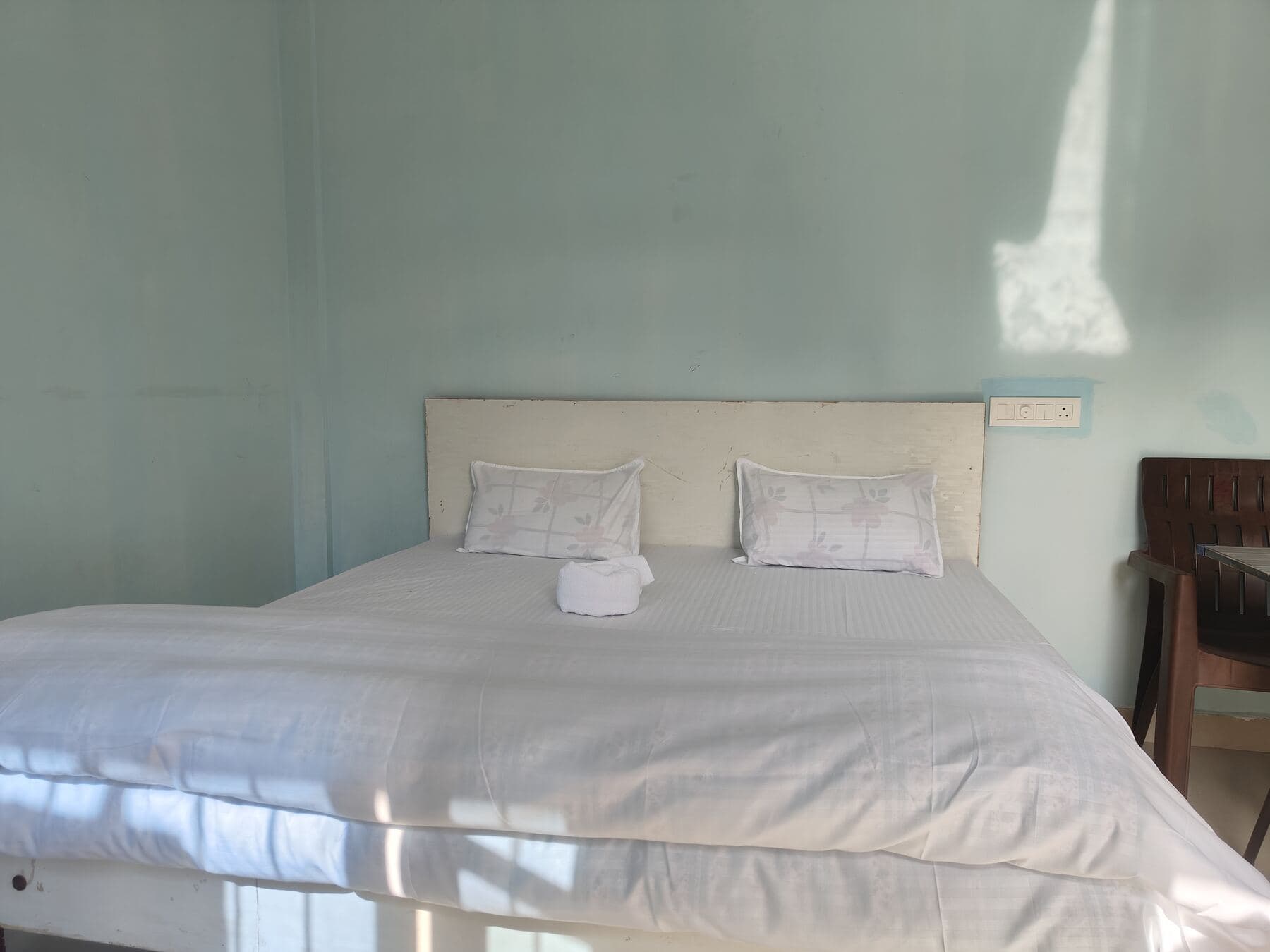 The bed in the Independent Mountain Suite.